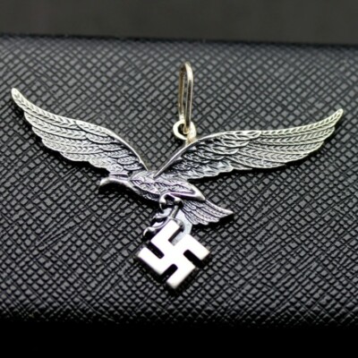 German WW2 eagle holding swastika silver pendant